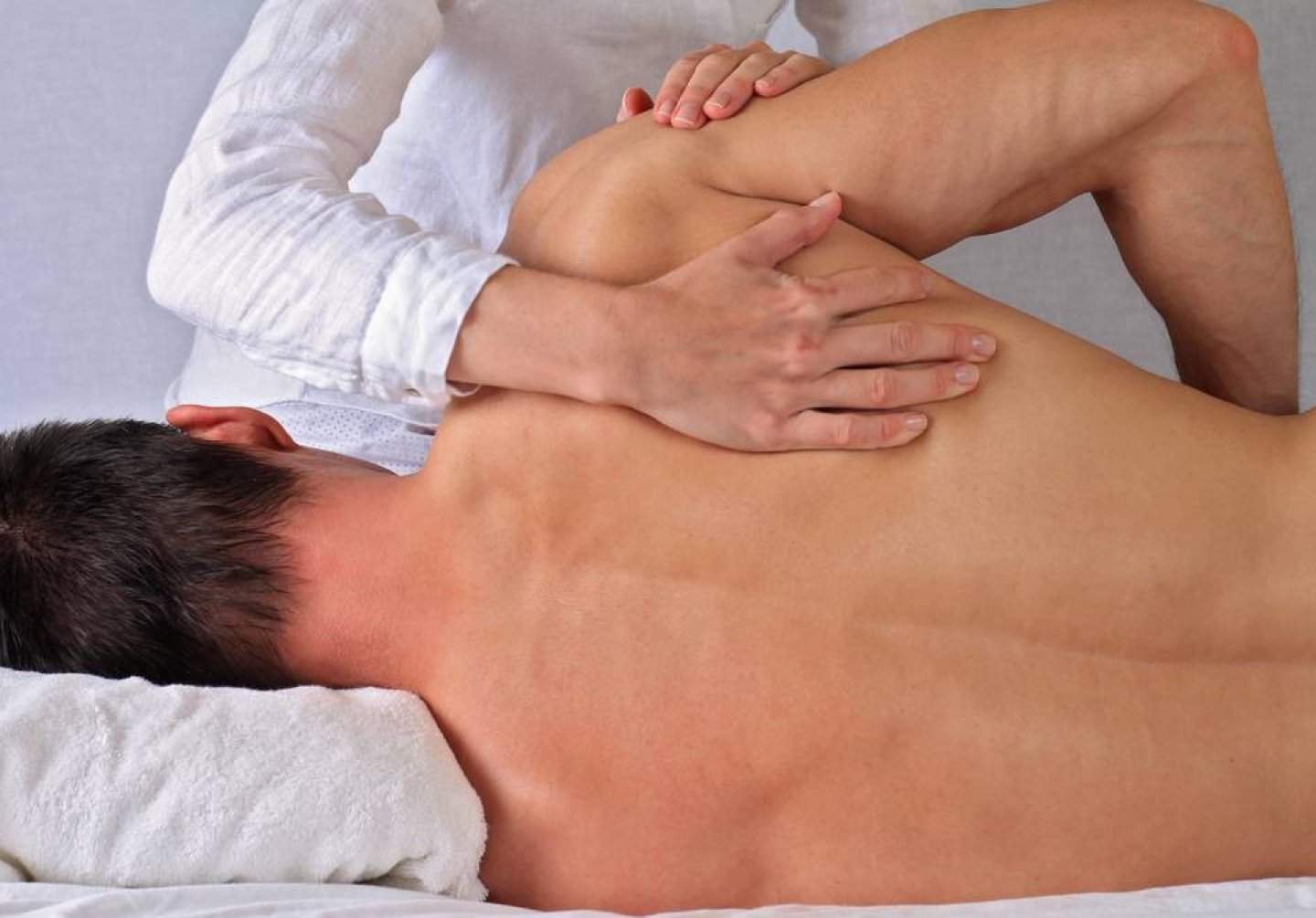 Chiropractic,,Osteopathy,,Manual,Therapy.therapist,Doing,Healing,Treatment,On,Man's,Back.